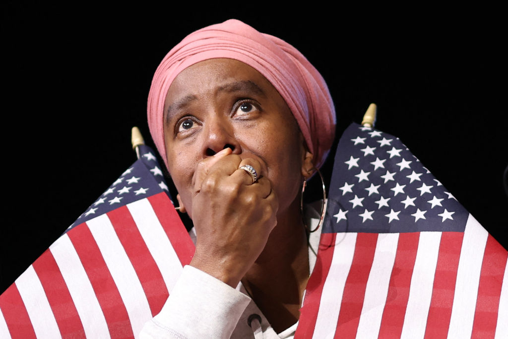 A Kamala Harris supporter takes in the news. Credit: Getty