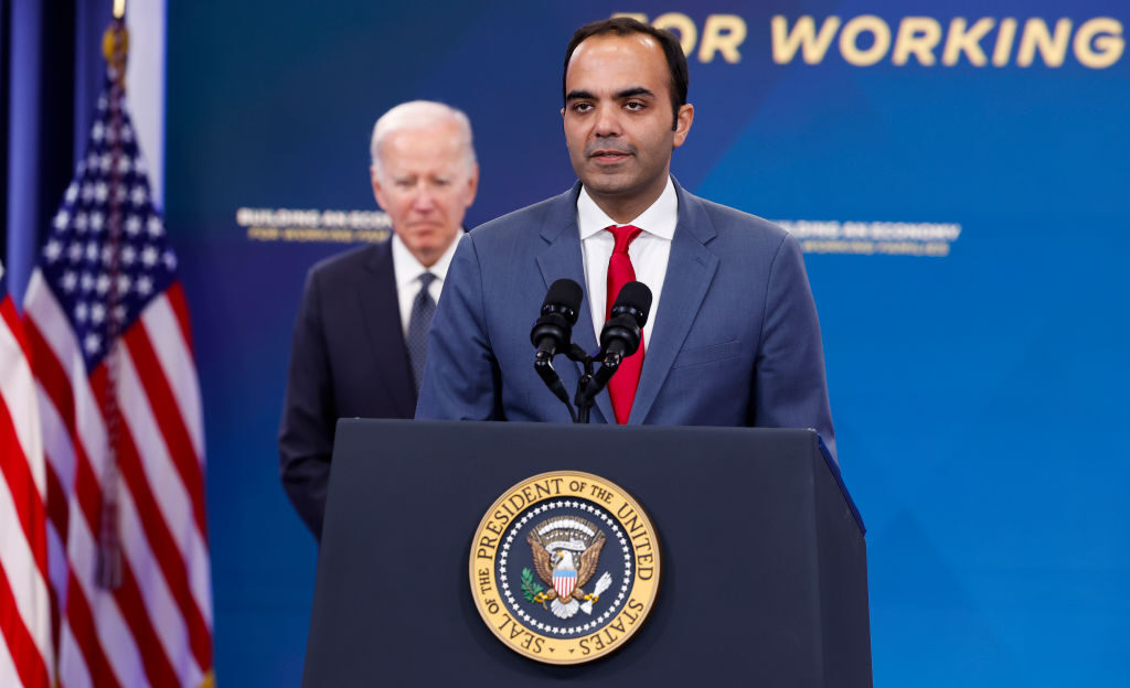 Consumer Financial Protection Bureau Director Rohit Chopra appears alongside Joe Biden. Credit: Getty