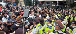 Antifascists clash with police at migrant hotel protest