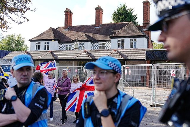 ‘Protesters dubbed “Pink Ladies” hold union flags outside The Bell Hotel in Epping back in August.’ Credit: Getty
