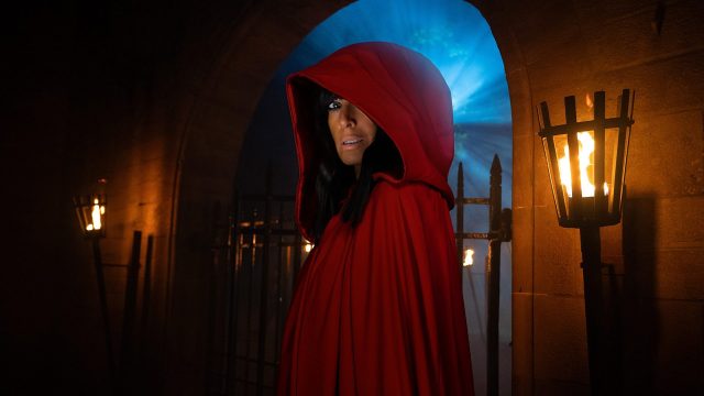 Claudia Winkleman dons the red cloak of the "secret traitor" (BBC)