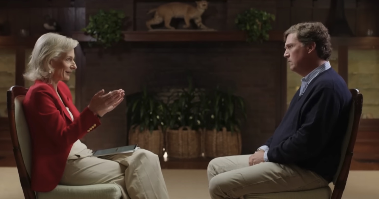 Tucker Carlson speaks to Zanny Minton Beddoes. Credit: The Economist/X