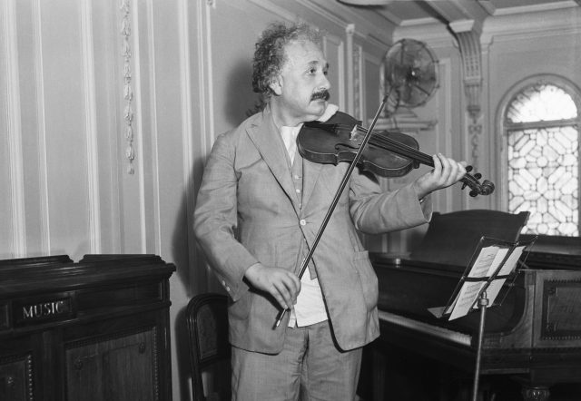 Albert Einstein plays his violin. (Bettmann/Getty)